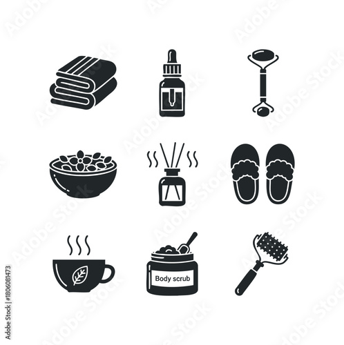 Collection of black icons representing spa and self-care items like towels, serum, face roller, and bath products