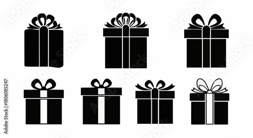 Collection of black and white gift boxes with bows, perfect for holiday celebrations and special occasions