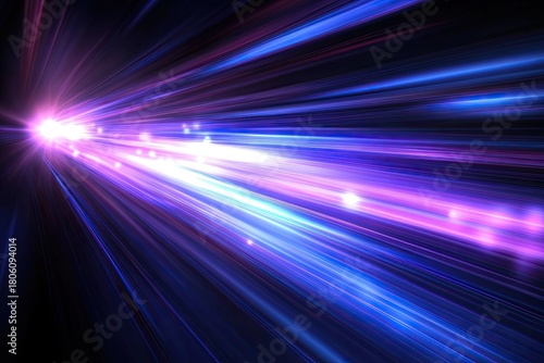 Radiating pink and blue light streaks on black