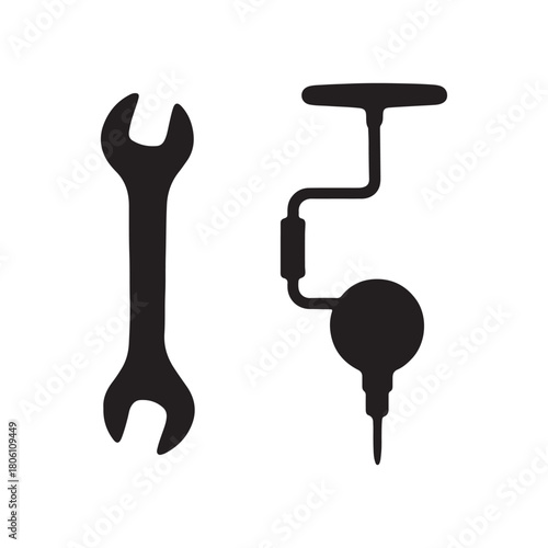 Wrench and hand drill isolated on for repair or construction