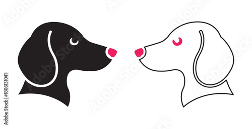 Two dog heads facing each other, one black, one white