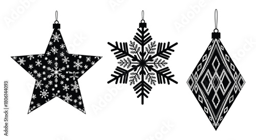 Three black and white christmas ornaments in the shape of a star snowflake and diamond on a white background