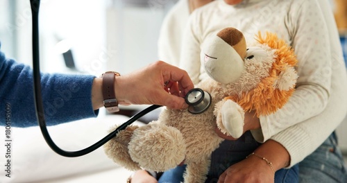 Foto Stuffed animal, stethoscope and hands with child in hospital for heartbeat, consulting and arrhythmia symptom