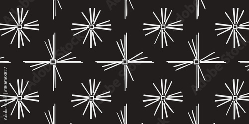 Geometric Starburst Pattern in Black and White for Seamless Design Background