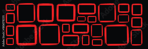 Abstract arrangement of diverse red square and rectangular frames with rough edges against a stark black background, creating a modern graphic pattern.