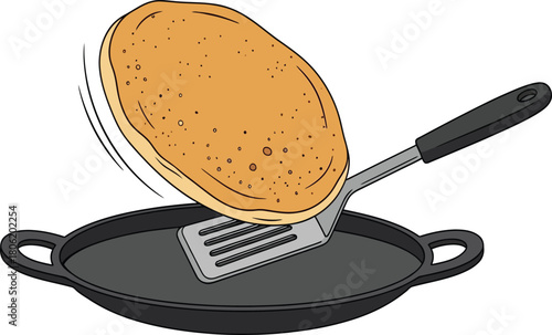Pancake Being Flipped With Spatula From A Frying Pan cooking food
