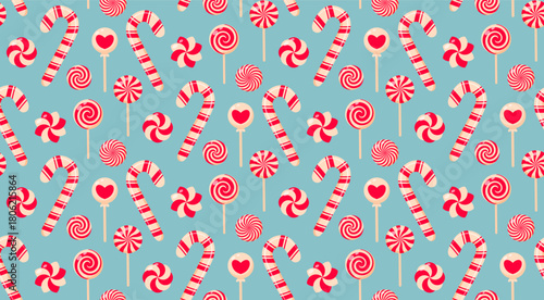 Seamless pattern featuring various red and white lollipops and candy canes on a soft pastel blue background. Cute and festive elements