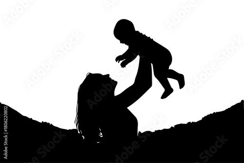 Silhouette of a mother lifting her baby up in the air against a bright white background with dark ground below