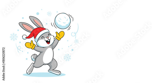 A cheerful gray rabbit wearing a red Santa hat and yellow mittens joyfully plays with a snowball, surrounded by snowflakes on a white background, symbolizing winter and holiday fun.
