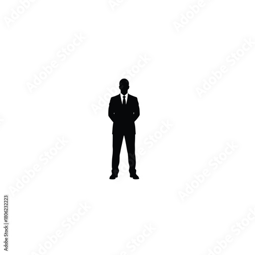 Silhouette of a man in a suit standing confidently against a stark white background
