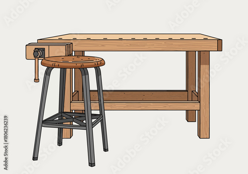Wooden workbench with metal stool in workshop.