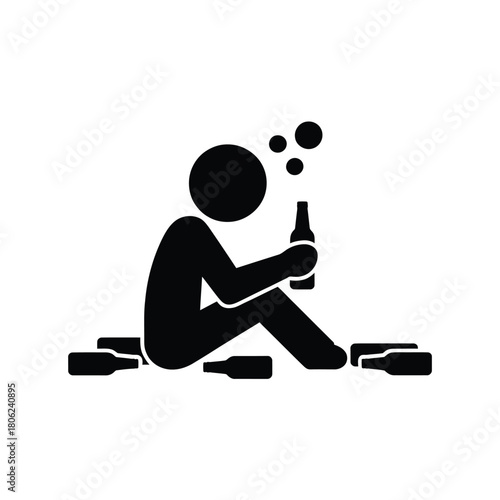 Silhouette of a person drinking alcohol surrounded by empty bottles