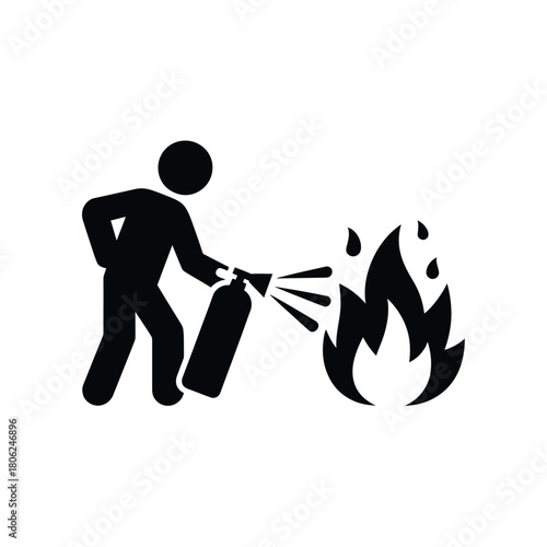 Person using a fire extinguisher to put out flames
