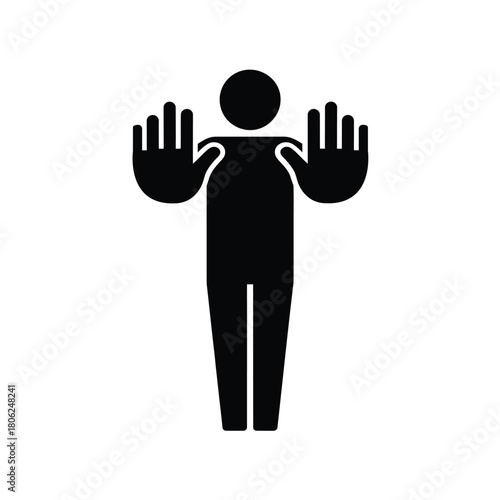 Silhouette of a person holding hands up in a stop gesture