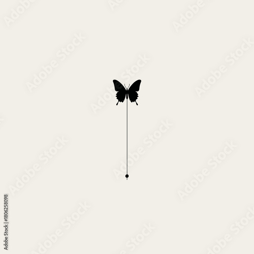 A minimalist black butterfly catheter silhouette with long tubing on a light background