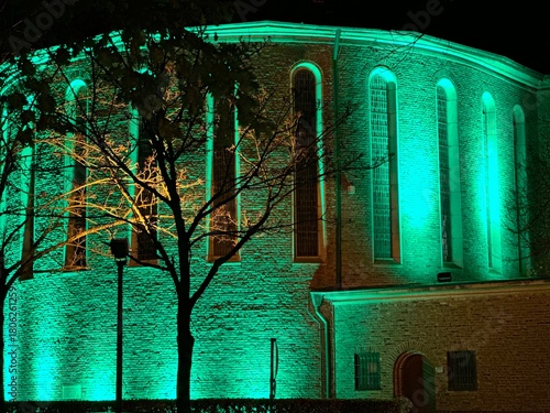 church in the night and green illuminated 