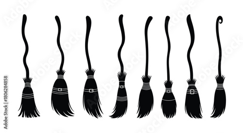 A collection of silhouetted witch brooms with varying handle curves and styles