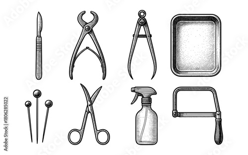 Vintage engraved surgical instruments collection with detailed medical tools