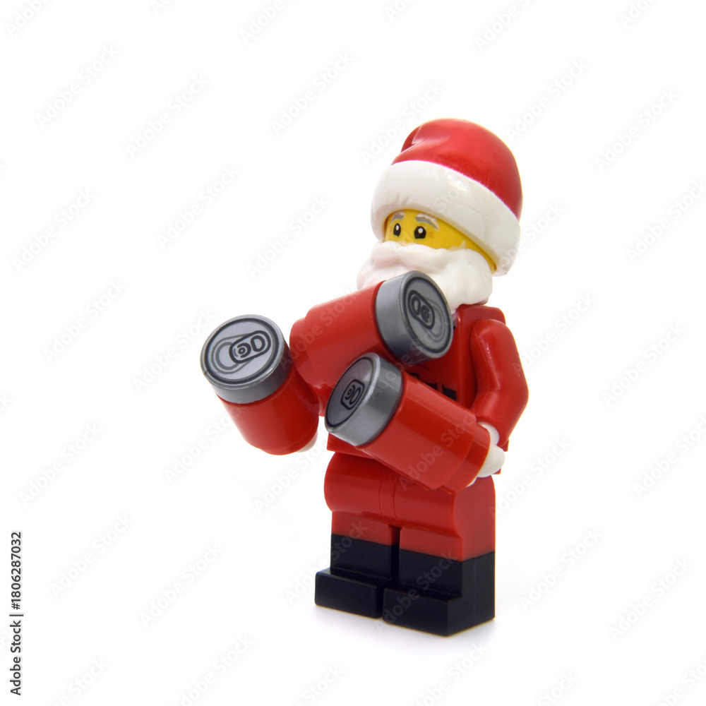 Naklejka premium Editorial illustrative image of lego minifigure of Santa Claus with Cola cans isolated on white.