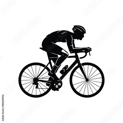 Silhouette of cyclist riding a racing bike actively