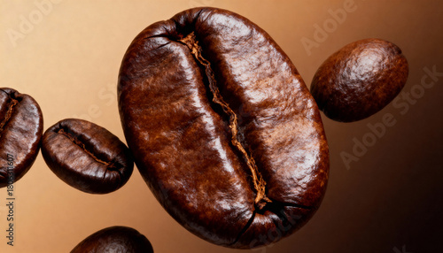 Coffee beans on brown background. Close-up image.