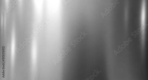 Brushed Metal Surface with Light Reflections and Textures.