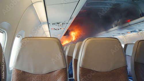 POV view seated inside an airplane with smoke and flames as flames engulf the airplane cabin