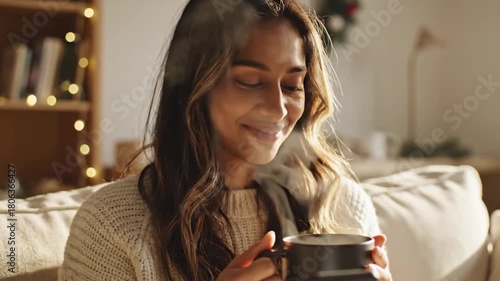 young woman drinking coffee at home