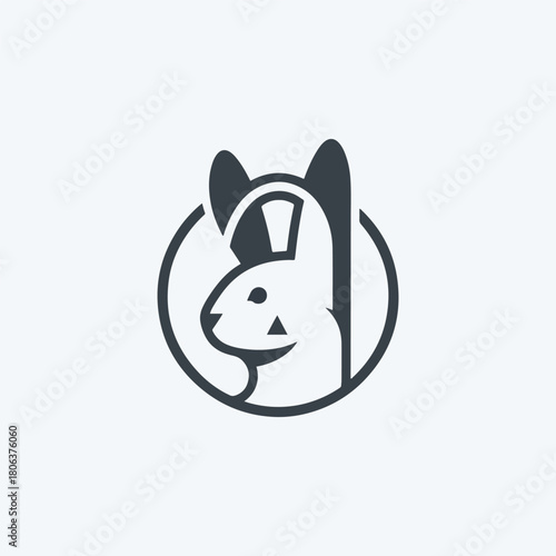 Minimalist logo design featuring a stylized rabbit head with prominent ears, enclosed within a circular frame on a white background.