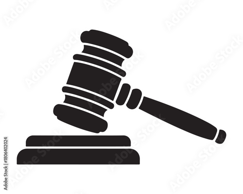  Black silhouette of a judge s gavel striking a sounding block for legal decisions silhouette