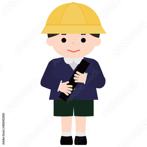 制服姿で卒業証書を抱える男の子