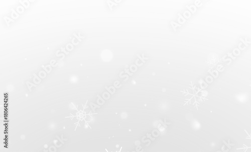 Magic falling snow with shimmering winter flakes on wide dark sky
