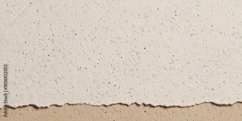 Neutral textured paper in white and beige tones with a torn edge