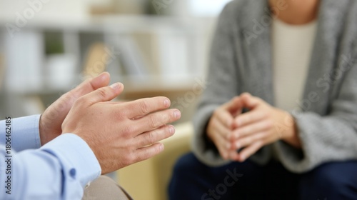 Two pairs of hands convey a silent connection during a counseling session. A chaplain's hands reach out to offer guidance, while an employee's hands show vulnerability and openness