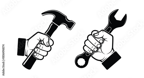 Hands gripping a hammer and wrench tools for construction and repair
