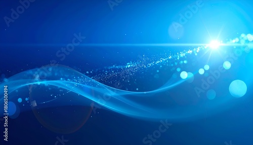 Abstract blue background featuring flowing light, particles, and lens flares