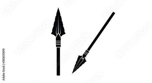 Two black silhouette weapons a spearhead and a simple arrow displayed
