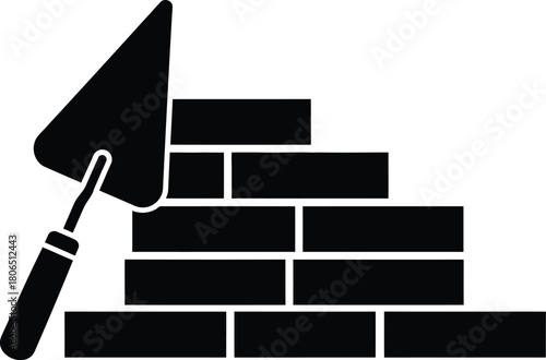 Black and white illustration of a brick wall and a trowel tool
