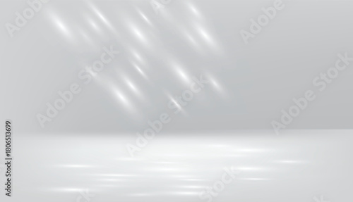 The overlapping shawdows of leaves falling on a grey wall and shawdow reflection on the wall in a minimal room