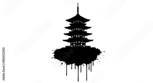 Pagoda silhouette with ink splatter