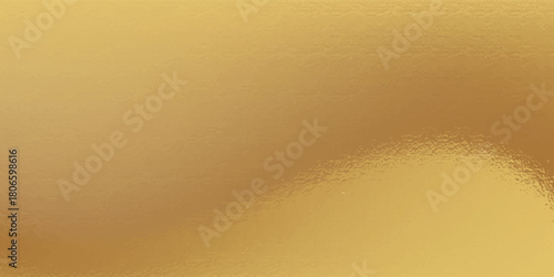 Gold wall texture background. Yellow shiny gold paint on wall surface with light reflection, vibrant golden luxury wallpaper sheet