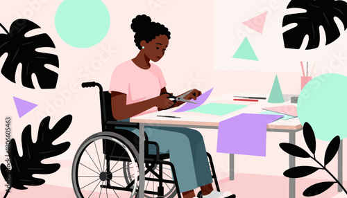 Young black woman creating art while sitting in a wheelchair at home  