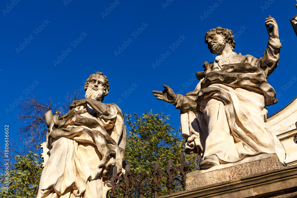 Obraz premium Baroque statues in front of the Saints Peter and Paul Church, Krakow, Lesser Poland, Poland, Europe