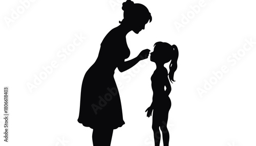 Silhouette of mother touching daughter's nose on a white background