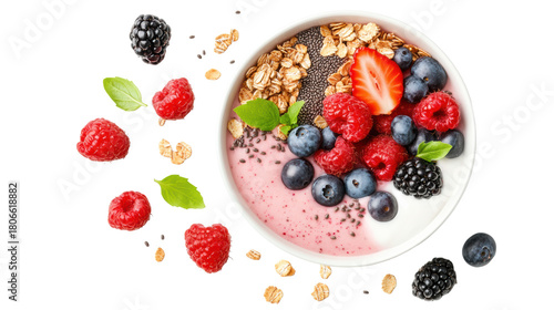 Healthy fruit and yogurt bowl with berries and granola.