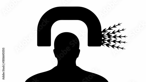 Silhouette of a person with a magnet attracting thoughts above their head in black and white art