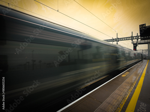 Train departing a UK station