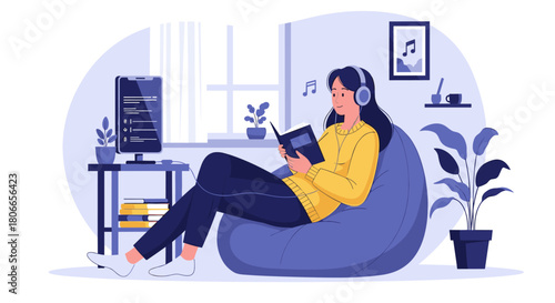 Young woman relaxing in a beanbag chair at home while reading a book and listening to music with headphones on her day off.