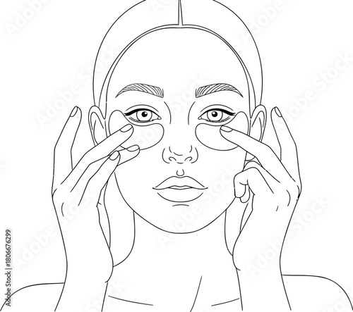 Woman applying eye patches for skincare routine portrait