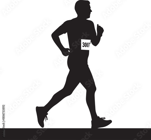 Silhouette of a male runner in motion during a race event with a bib number displayed